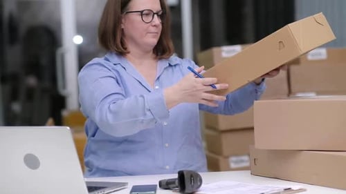 Online Shop Small Business Checking and Track Orders and Handling Product Packaging and Shipping