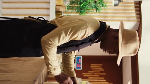 Vertical Video African American Seller Preparing Local Farmers Market Products