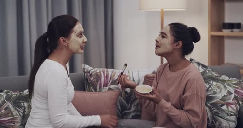 Women Applying Face Masks at Home