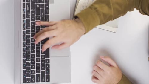 Vertical video of University student thoughtful, studying.