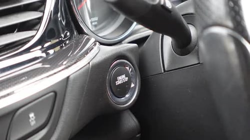 Pressing the Start Engine Button on Car