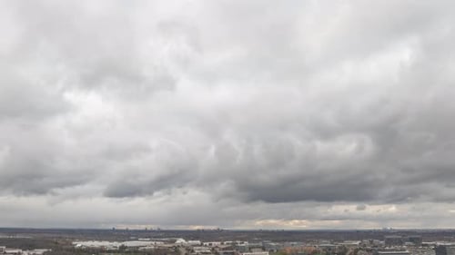 Dark Ominous Clouds Over City Landscape