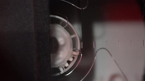 In a VCR a Cassette is Inserted and the Drum with the Film Rotates Closeup