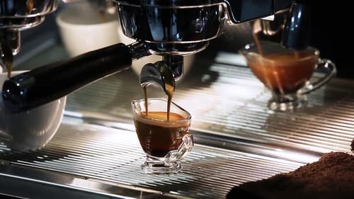 Espresso Extraction From a Shiny Espresso Machine