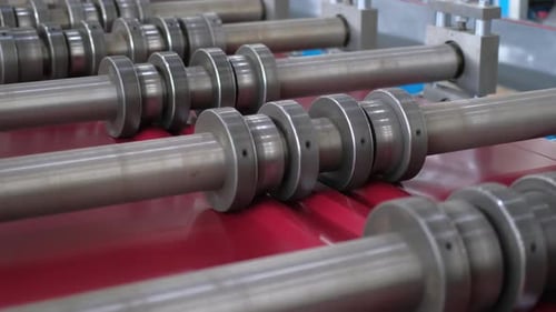 Metal Sheet Roof Production at Industrial Plant Production Line of Metal Profile at Modern Metalwork