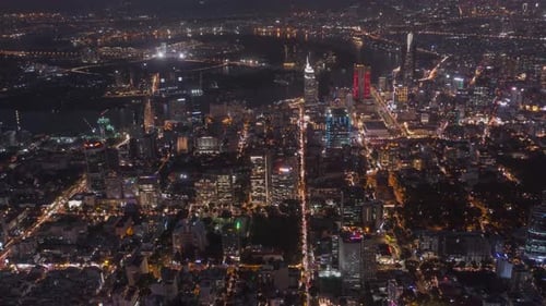 Ho Chi Minh City, Vietnam evening aerial time lapse featuring traffic, key buildings of skyline and