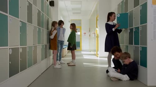 Elementary School Class Children Communicate with the Teacher Answering Question