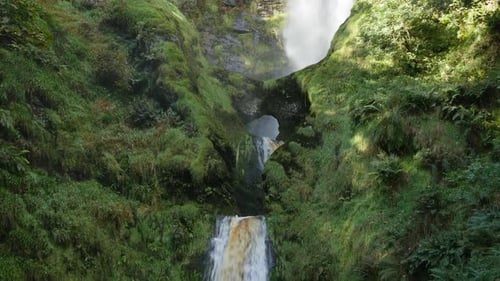 Pistyll Rhaeadr Falls is an enchanting waterfall with a lovely stream with flowing water over the ro