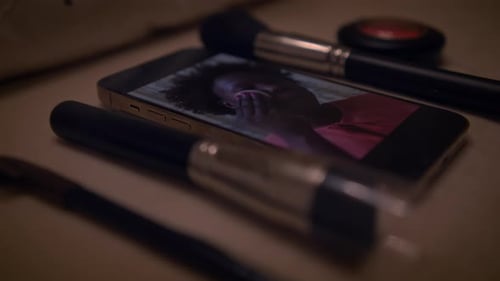 Makeup Brushes and Cell Phone Displaying Tutorial