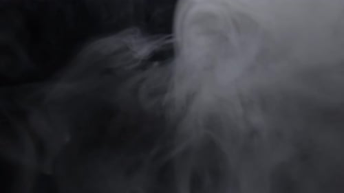 Abstract Smoke Plumes on Dark Background