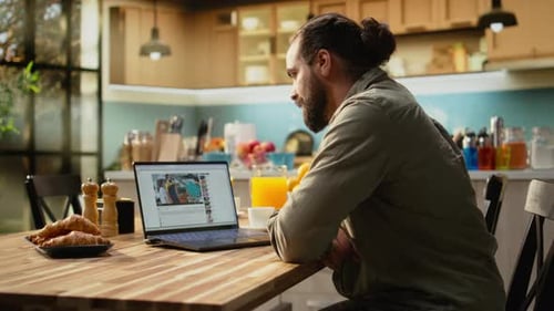 Videosharing Platform Modern Man Using Laptop Playing Video Content