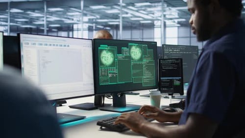 Men Coding Data Critical Error Message Appears