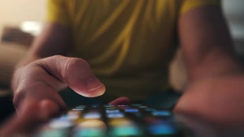 Man Scrolling And Searching Mobile Applications On Smartphone