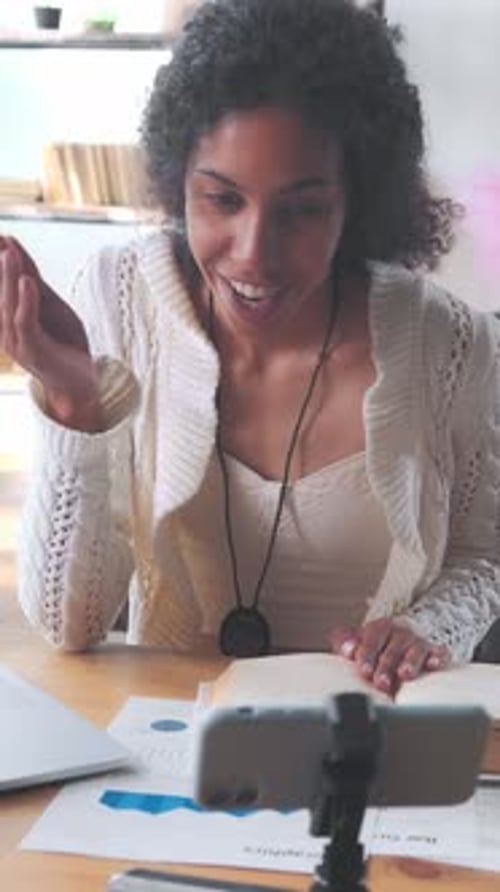 Woman Teaching Online Class From Home At Desk