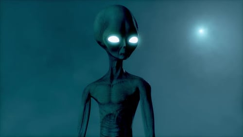 Scary Gray Alien Standing and Blinking at the Dark