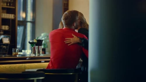 Excited Girls Running Into Modern Bar. Cheerful Women Hugging Friends Near Bar