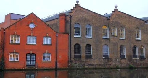 Camden Historical Industrial Buildings In Regent's Canal In London, United Kingdom. Sideways