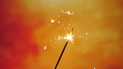 Celebration with Glowing Sparklers Warm Holiday Fireworks in Vibrant Colors Joyful Nighttime Scenes