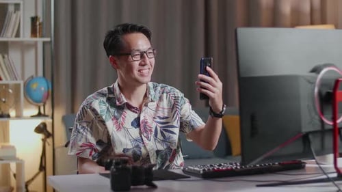 Adult Man in Wheelchair on Video Call at Home