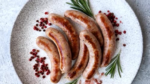 Overhead Shot of Delicious Sausages with Red Pepper