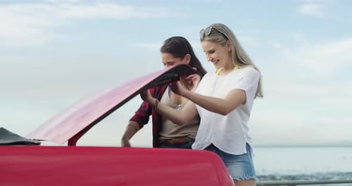Happy friends open trunk with skateboard at beach, smile and walking outdoor
