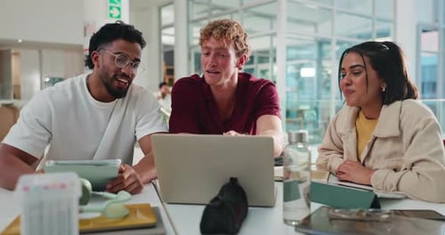 Pointing, laptop and discussion for exam, group preparation and studying on campus