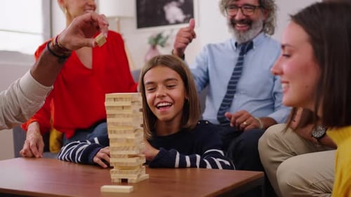 Friends and Family Play Tower Stacking Game