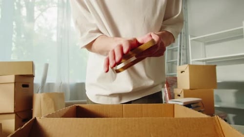 Moving to New House Real Estate Buying Flat Apartment Young Man Unpacking Cardboard Boxes Guy Owner