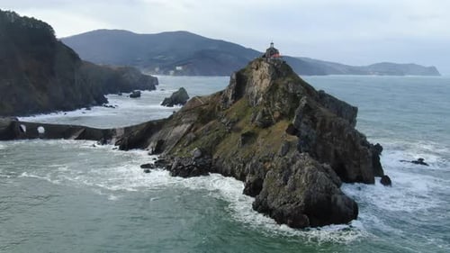 Drone orbit shot Gaztelugache is an islet in the Vizcaya town of Bermeo, Pais Vasco, Spain.