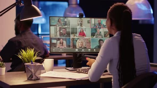 Office Worker Attending Business Meeting Videocall Conference