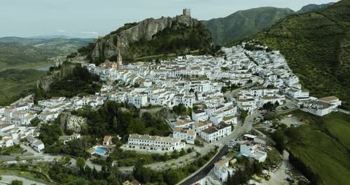 Aerial view of medieval town with castle and mountain, Spain.