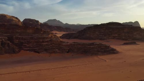 Wadi Rum rocks and shadows at sunset, Valley of the Moon in Jordan, aerial view