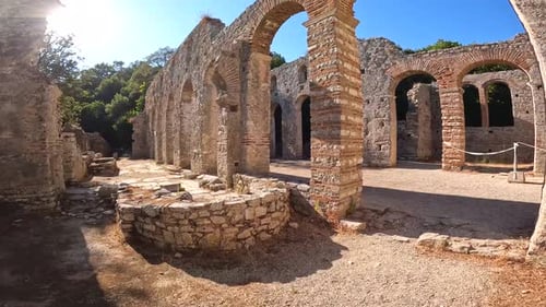 Panning at the entrance of the theater in the archaeological ruins of Butrint or Butrinto National P