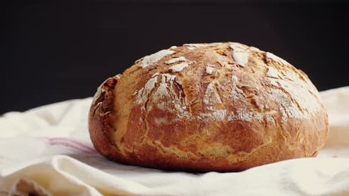 Whole Grain Bread Put on Kitchen Wood Plate By the Chef in Bakery