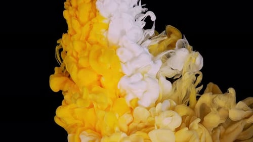 Yellow White Ink Paint Top View Blending in the Water in Slow Motion Ink Liquid Underwater on Black