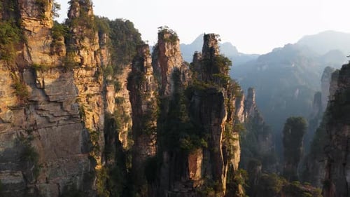 Flyover Sandstone Rock Formations Of Zhangjiajie National Forest Park In China. Aerial Shot
