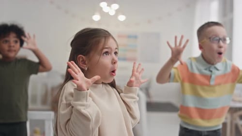 Happy Children Dancing Together Indoors