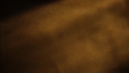 Abstract Golden Light Rays and Dust Particles