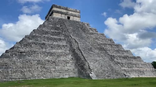 Slow pan of the famous Mayan temple at Chichen Itza Mexico, from the other side.