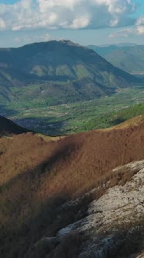 Rocky mountains and valley before sunset aerial