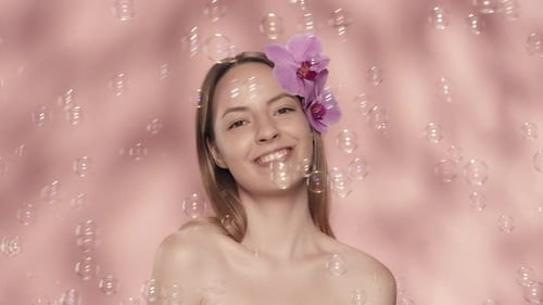 Elegant Woman with Orchid and Bubbles
