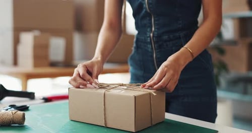 Woman, bow or hands with box for delivery, supply chain or packaging order at warehouse