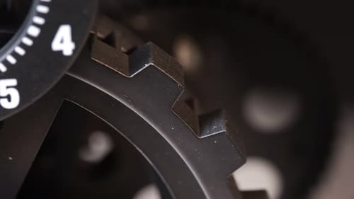Clock Gears Turning Close Up