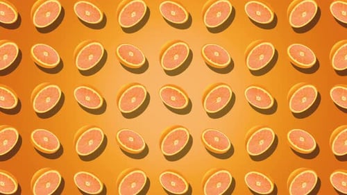 Seamless Looping Grapefruit Halves Rotating on Orange Background