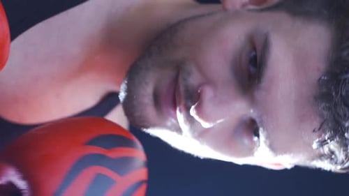 Close Up of Sweaty Boxer in Black Tank Top