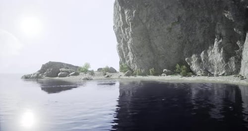 Calm Shoreline with Rocky Cliffs and Peaceful Water Reflections at Sunset