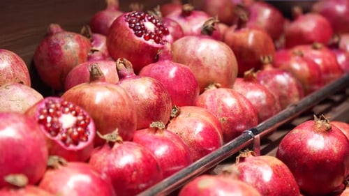 a Juicy Red Pomegranate on the Counter in a Store