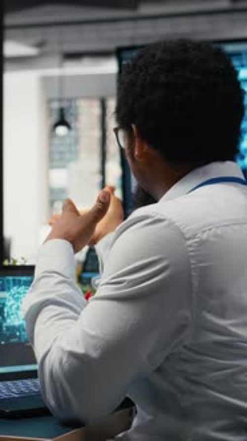 Vertical Video System Administrators Working in AI Startup Training Predictive Models