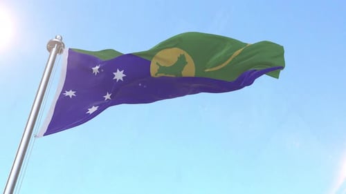 Realistic Christmas Island Flag Waving in Blue Sky