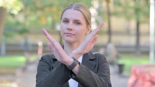Outdoor Portrait of Rejecting Businesswoman in Denial